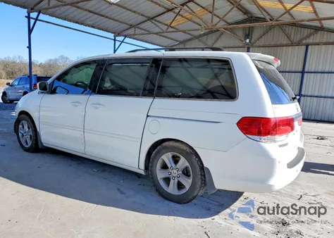 2010 Honda Odyssey Touring z USA, uszkodzony, nr VIN 5FNRL3H9XAB069199